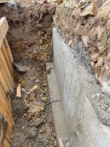 Voile + longrine réalisés en passes courtes alternées en reprise en sous-oeuvre (RSO)