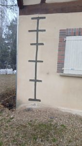 Traitement par agrafages de fissures