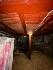 BATI-IDF vue d'ensemble d'une cave renforcée à l'italienne : poutres HEB 120 et hourdis terre cuite après passivation — Paris 19e copropriété boulevard de la Villette