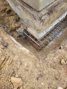 BATI-IDF ferraillage d'un massif d'angle en béton armé au pied du pavillon, reprise en sous-œuvre — La Celle-Saint-Cloud (78).