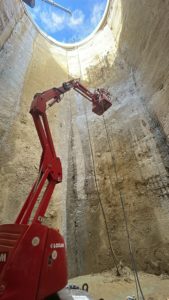 BATI-IDF atelier de finitions sur paroi moulée, intervention en nacelle dans le puits du Siphon Ilet — Le Havre (76).