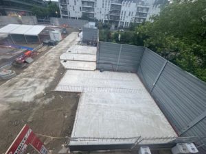 BATI-IDF radier en béton armé et voiles périphériques en blocs à bancher de la fosse à déblais — rameau L15, Saint-Denis (93).