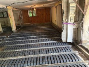 BATI-IDF plancher de type dalle portée en poutrelles-hourdis en cours de réalisation après reprise en sous-œuvre — Sassenage (38).