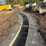 Murettes-guides circulaires et dalle béton armé — Bassin Sticker, Sin-le-Noble (59)